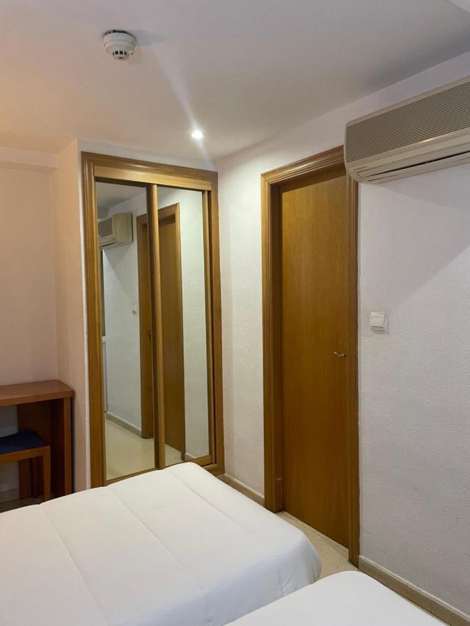 Hostal Maria Elche Exterior photo Sliding doors